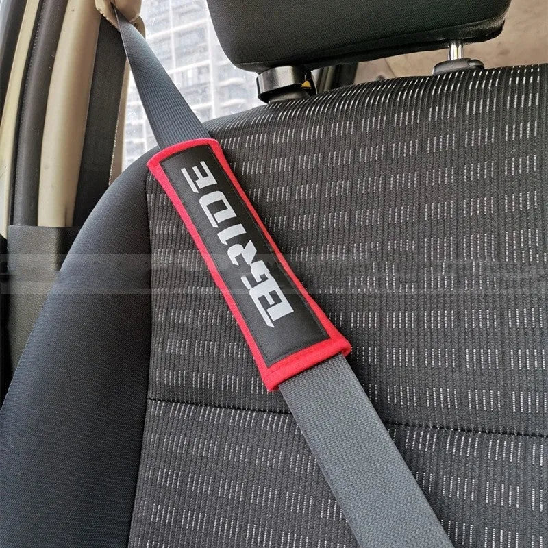 Car safety belt shoulder pads in black, blue and red with cotton sponge cloth and embroidery detailing