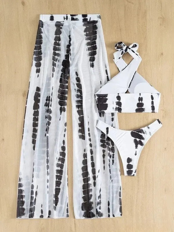Adult female three-piece bikini swimsuit set with mesh trousers in black or blue printing.