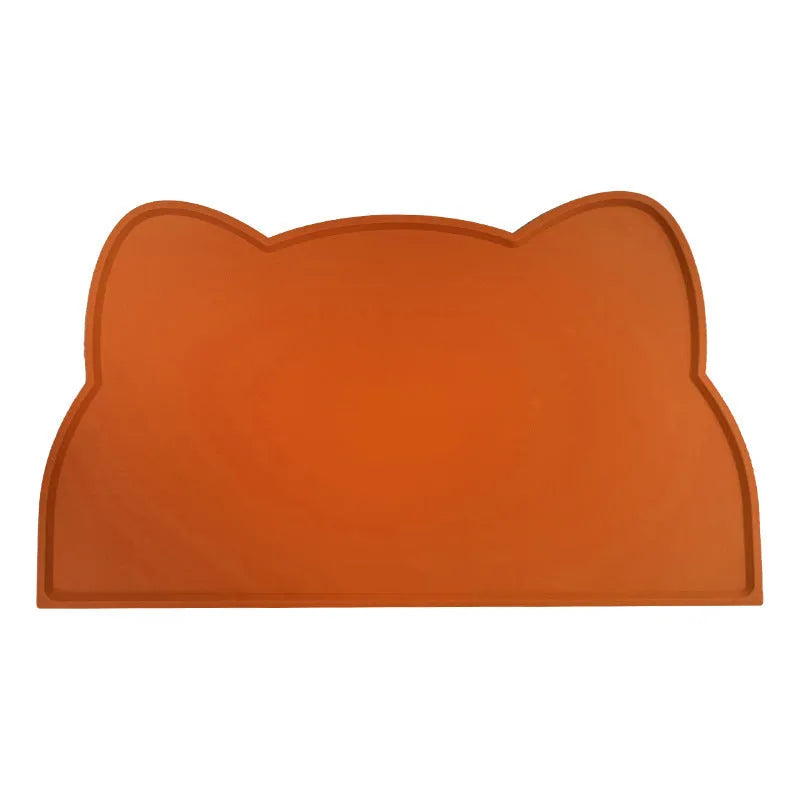 Blue silicone pet feeding mat measuring 44cm by 24cm under a dog bowl