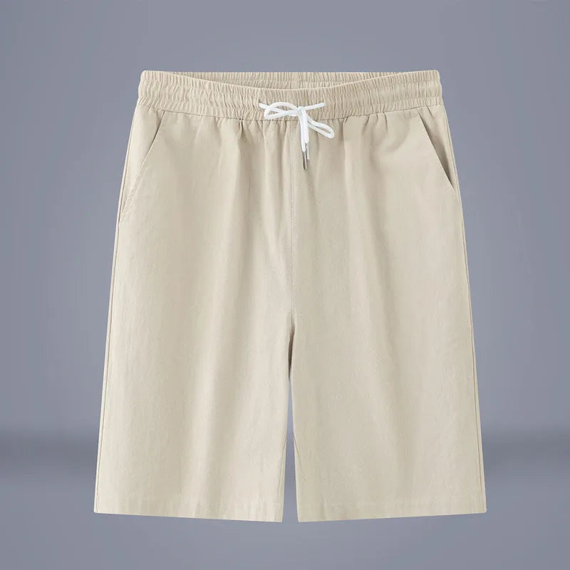 Solid colour cotton linen cropped trousers with a drawstring waist in Army Green