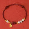 Hetian Jade Cinnabar Red Rope Women's Bracelet made of 925 silver with an adjustable chain.