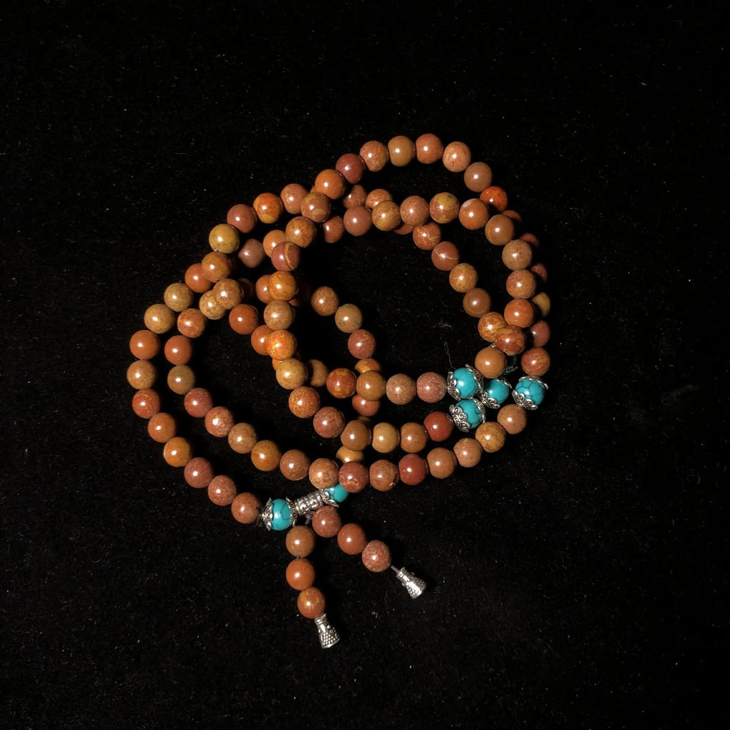 Stone bead bracelet with 108 geometric beads measuring 5-6mm in diameter