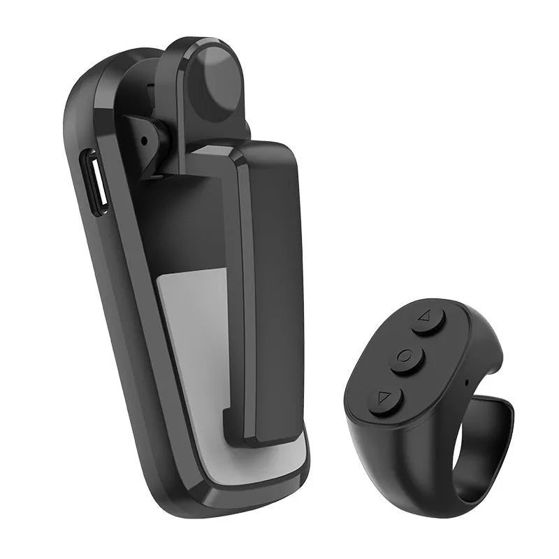 Wireless page turner remote control and foot clicker for tablets on a wooden table.