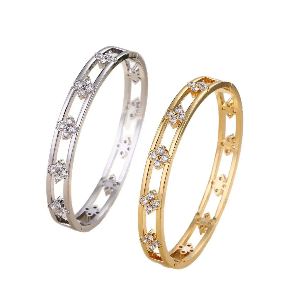 Gold and silver buckle options of hollow women's bracelet with four-leaf clover inlaid zircon design