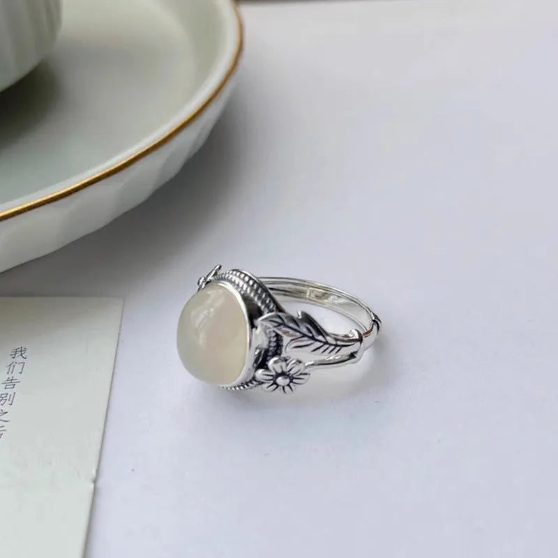 Adjustable open mouth copper vintage ring with white chalcedony colour stone