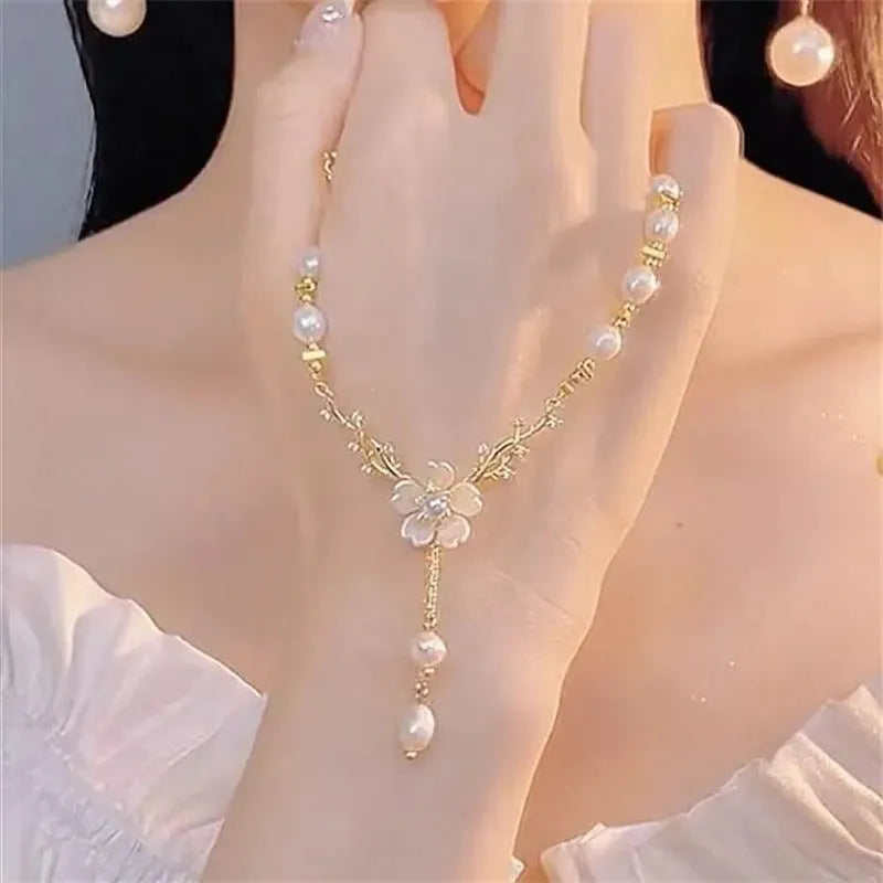 Alloy pearl chain necklace with floral and rose decorative elements in pearl flower colour