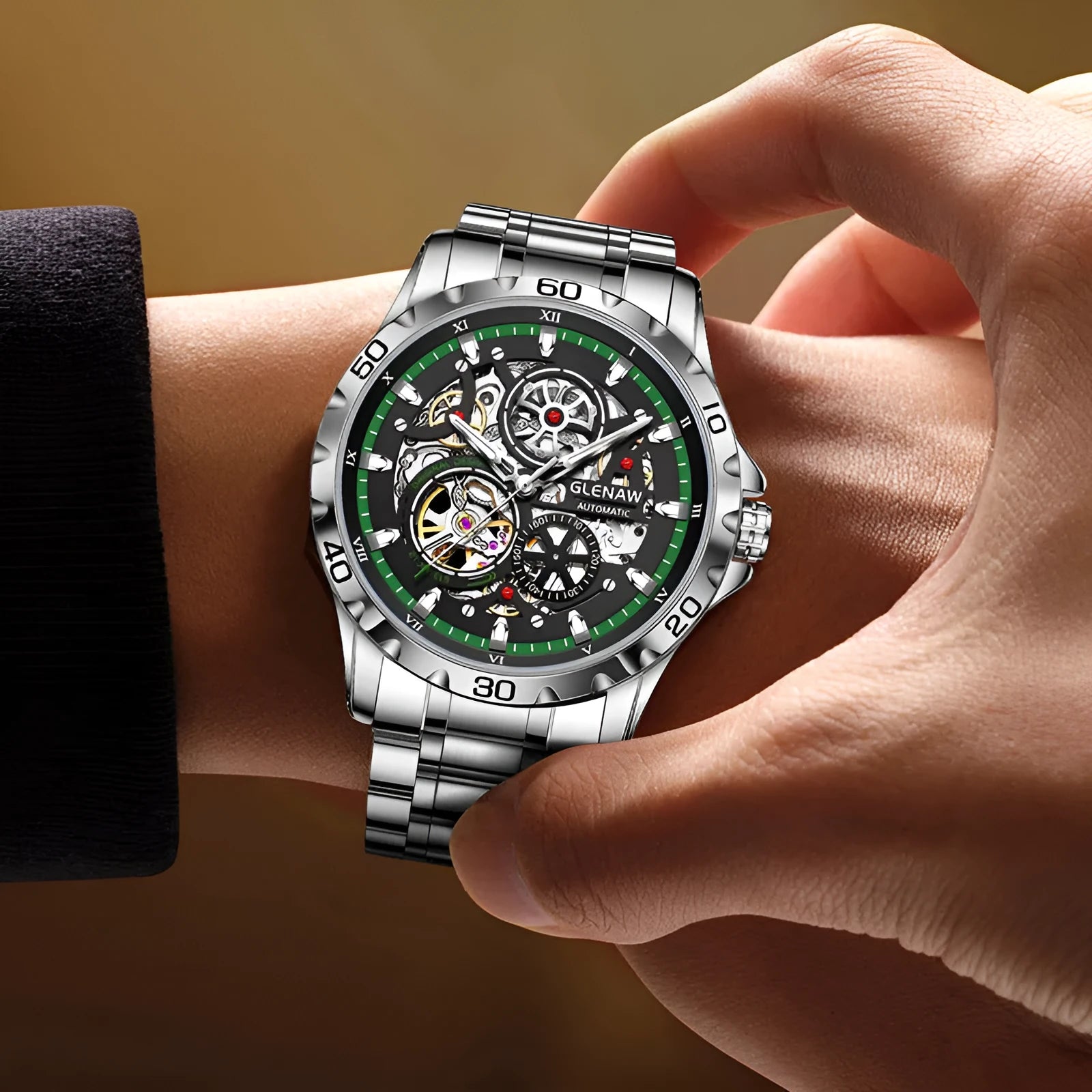 Silver automatic mechanical watch with hollow-out design showing movement through transparent back