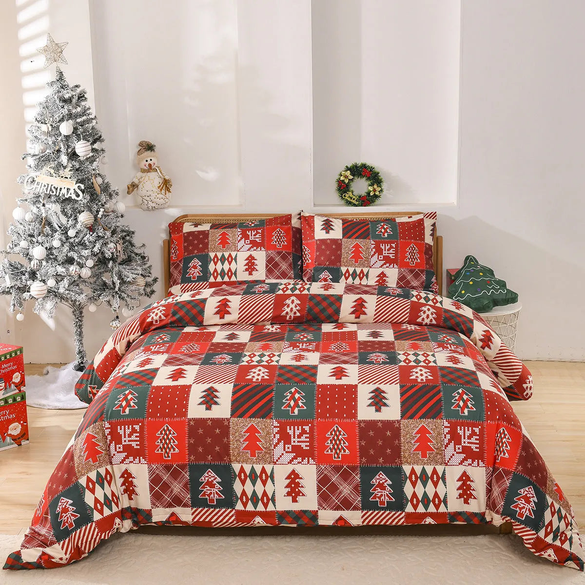 Christmas red plaid pattern bedding three-piece set with quilt cover and pillowcases on a bed.