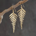 Women's simple tassel bohemian gold leaf-shaped earring made of alloy, geometric shape
