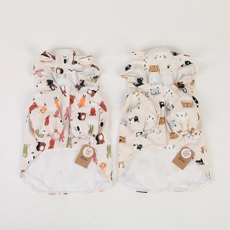 Beige cartoon dog raincoat with animal design showing front leg sleeves and back coverage