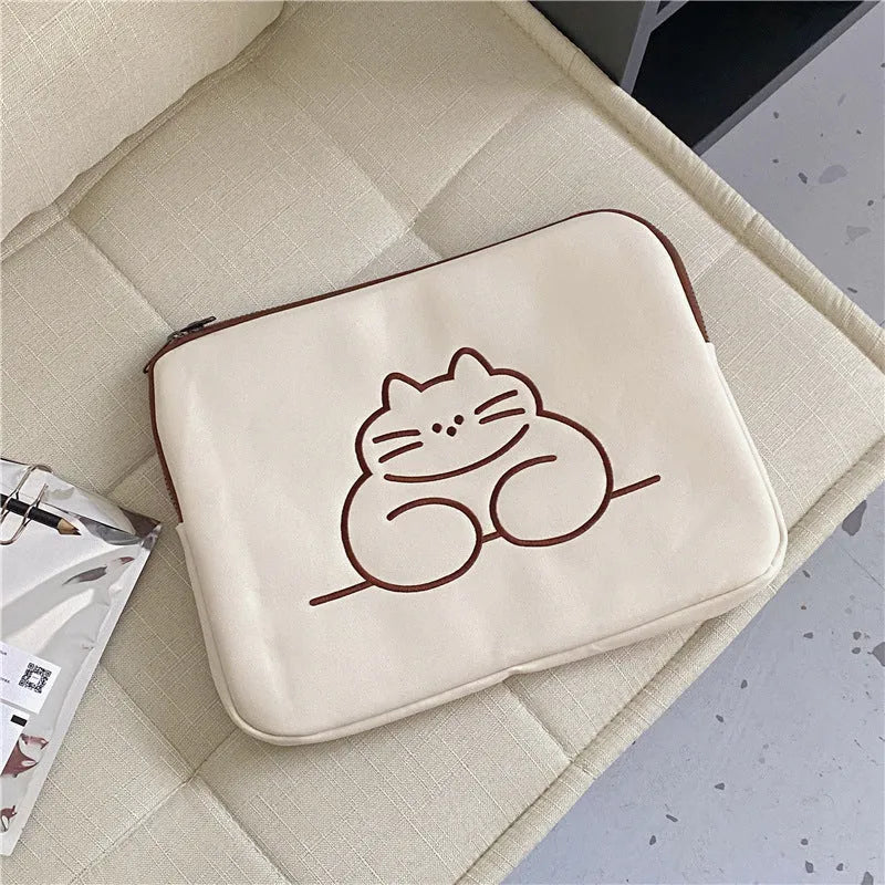 Nylon tablet protective sleeve with embroidered cat design and zipper closure