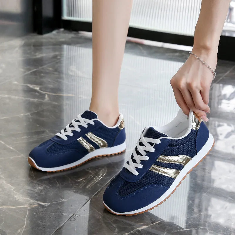 Blue women's artificial leather sports shoes with cross straps and non-slip rubber sole