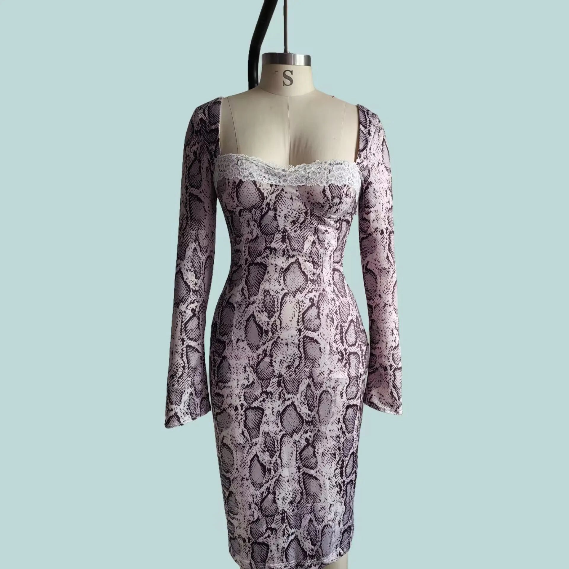 Grey slim fit lace dress with long sleeves, A-line skirt, and a digital 3D printed pattern.
