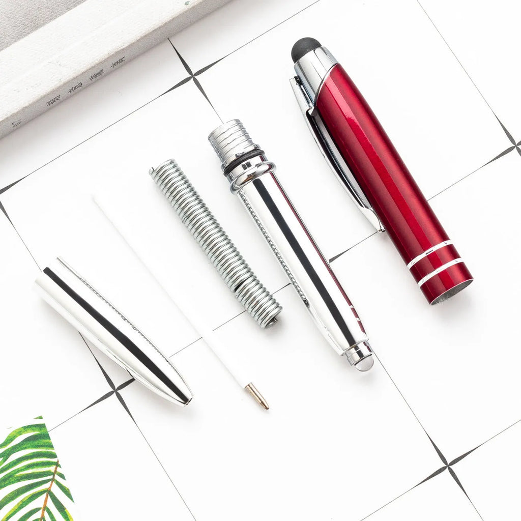 Red metal capacitive stylus and ballpoint pen with built-in LED light, shown with bullet-type nib.