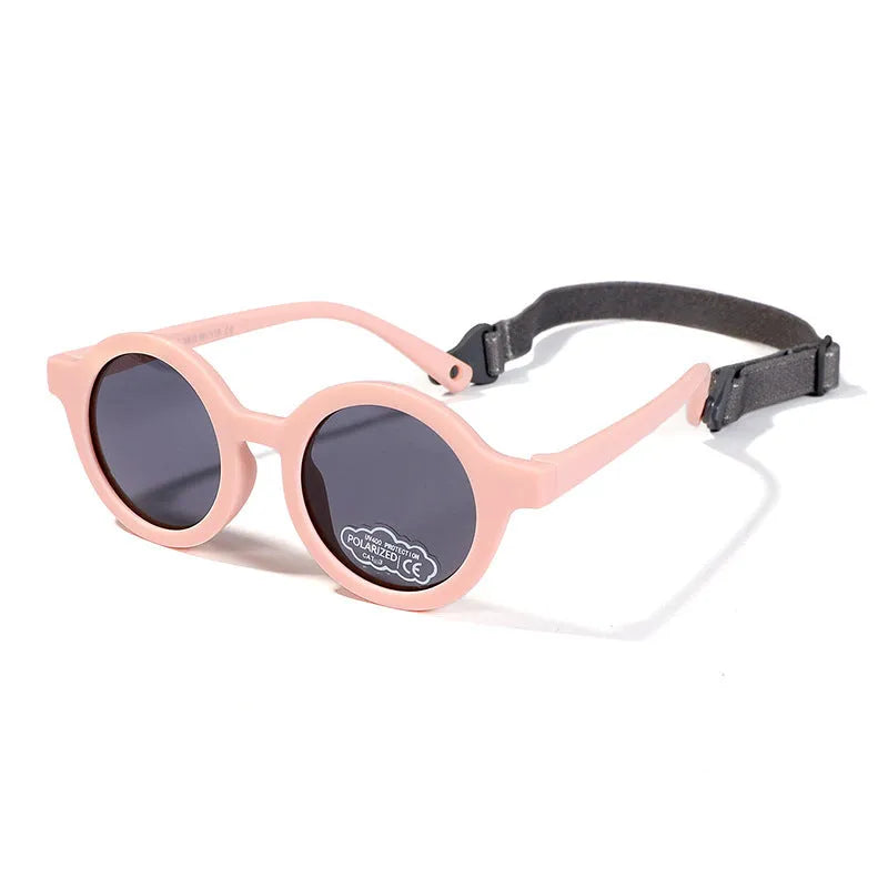 Children's silicone sunglasses with round frames and polarised lenses for 0-3 year old UV protection