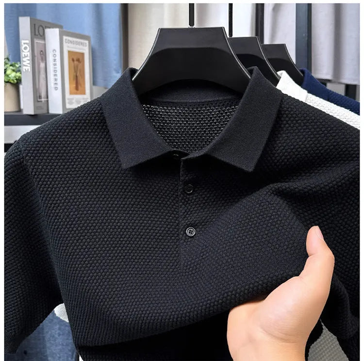 Loose fitting short sleeve cotton pullover sweater in a solid colour on a hanger
