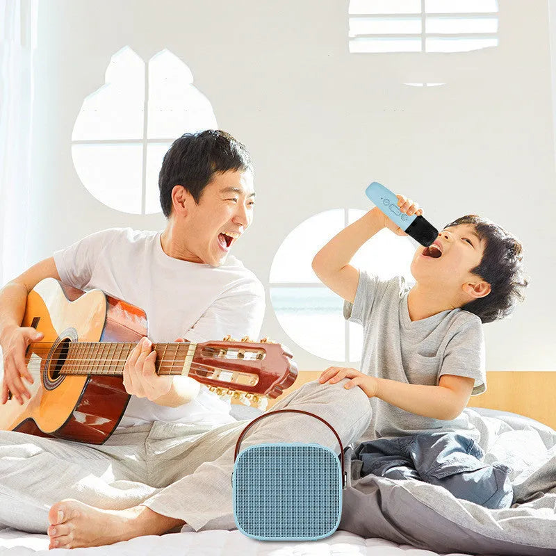 Compact blue, pink, or white wireless Bluetooth speaker with microphone and USB port.