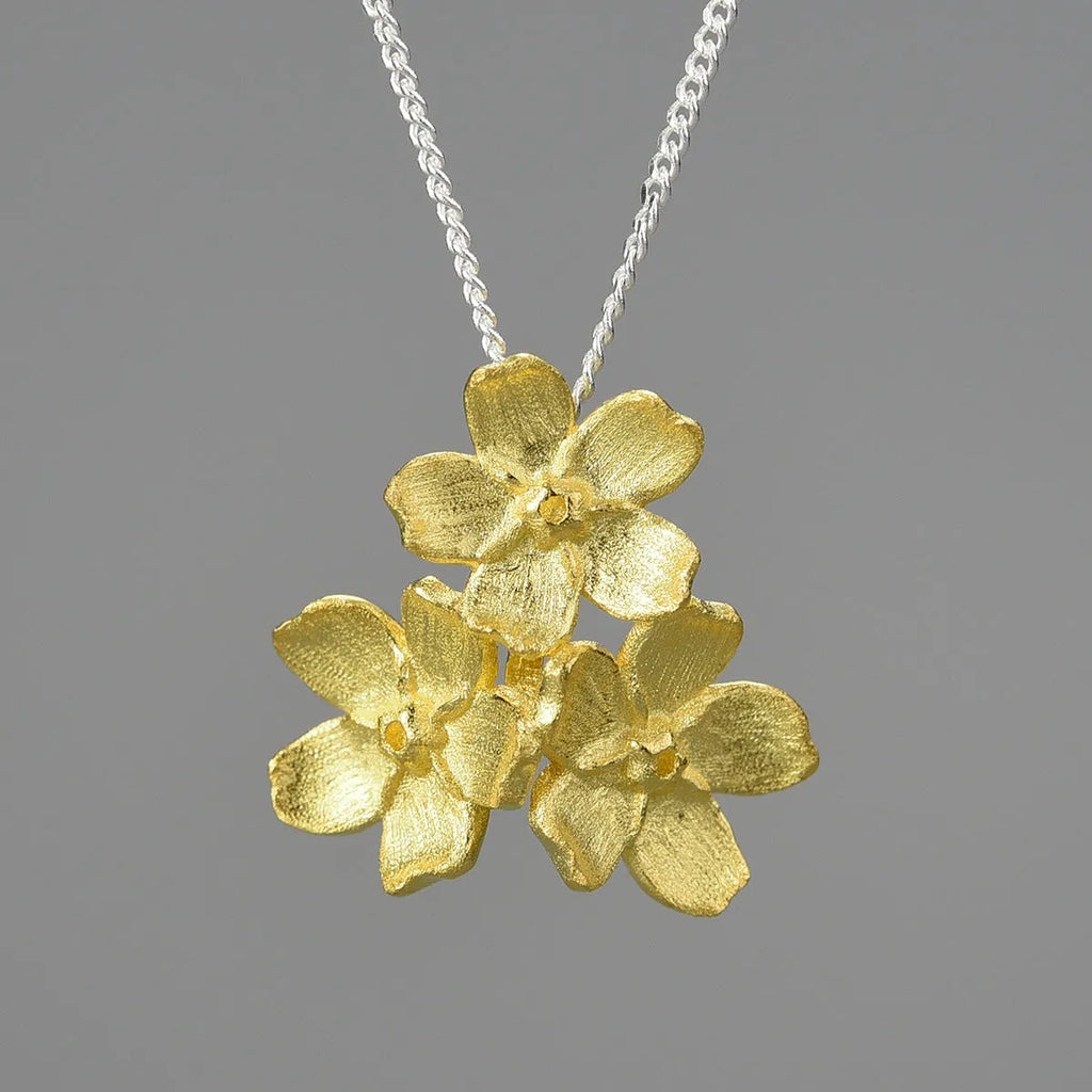 Myosotis Sylvatica sterling silver pendant with floral design in electroplated gold, silver gold, or silver finishes