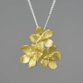Myosotis Sylvatica sterling silver pendant with floral design in electroplated gold, silver gold, or silver finishes
