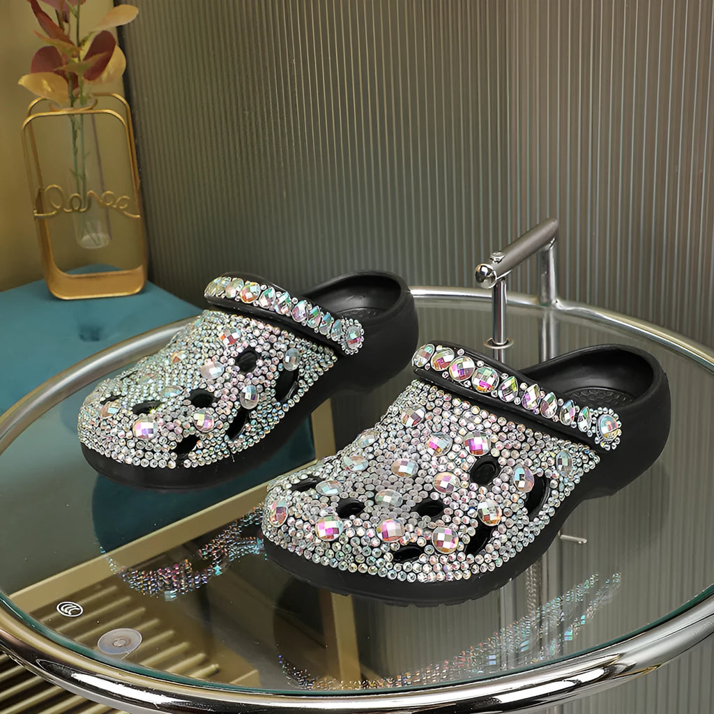 Black platform sandals for women with rhinestone detail on EVA upper and sole.
