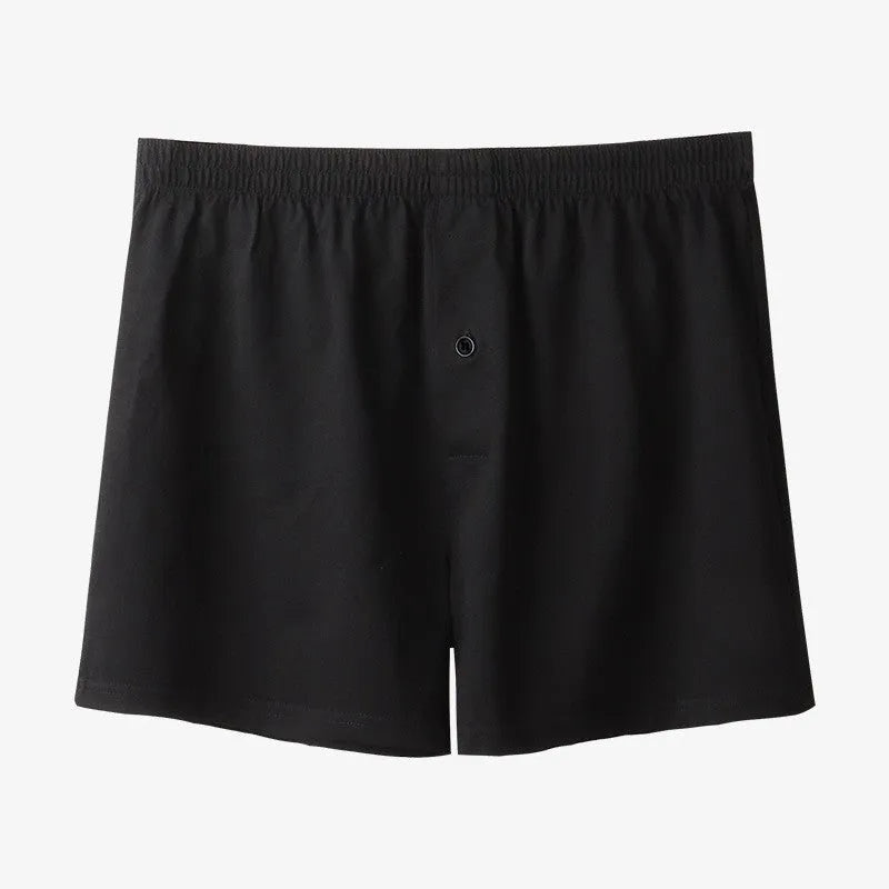 Men's high-waist loose fit cotton boxer shorts in black, shown flat.