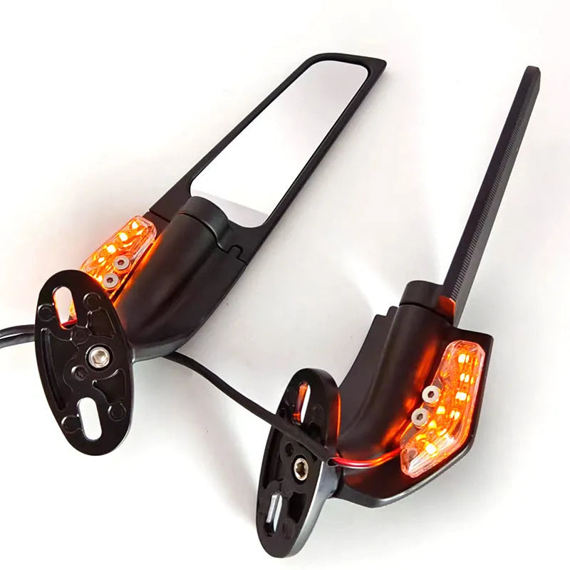 Pair of yellow aluminium motorcycle spoiler rearview mirrors with convex glass lenses and integrated side lights.