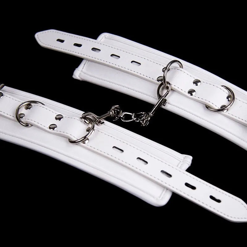 White PU sponge bondage restraint set including handcuffs, foot cuffs, and neck scarf