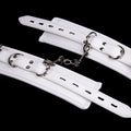 White PU sponge bondage restraint set including handcuffs, foot cuffs, and neck scarf