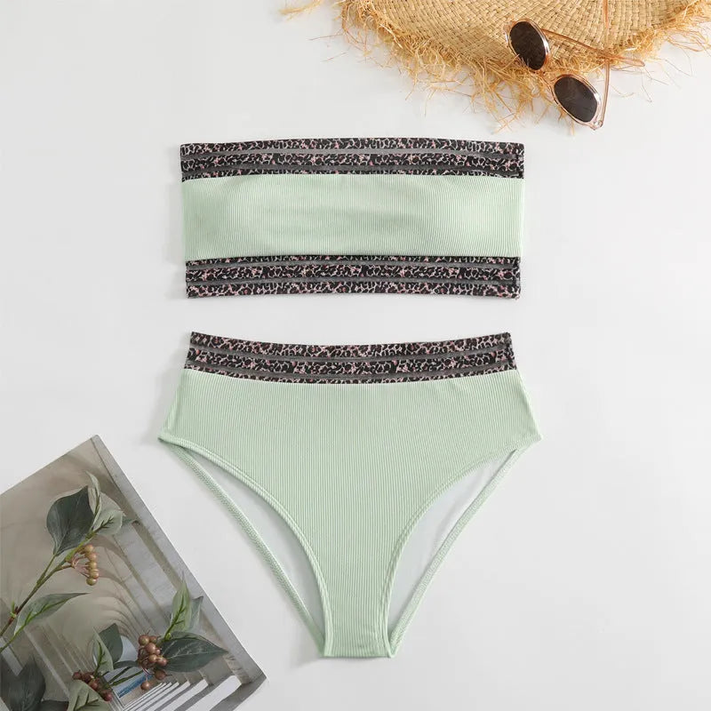 Black strapless bandeau bikini with leopard print pattern, showing front view of swimsuit