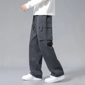 Boys straight leg cargo pants with drawstring waist and large side pockets in polyester fabric