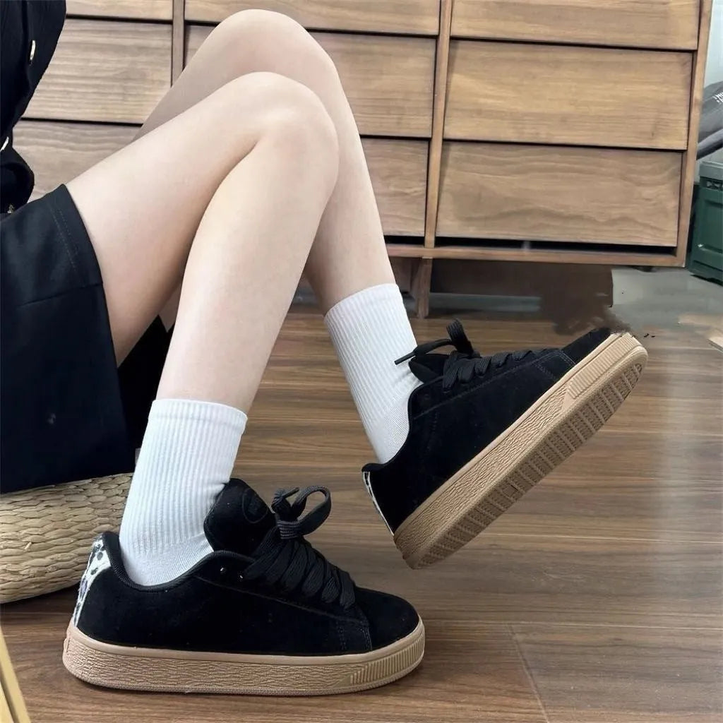 Black retro low-top sneakers with waterproof platform and English muffin heel