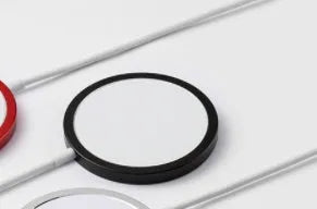Magsafe magnetic wireless charger for iPhone in silver, black, blue, or red with USB cable