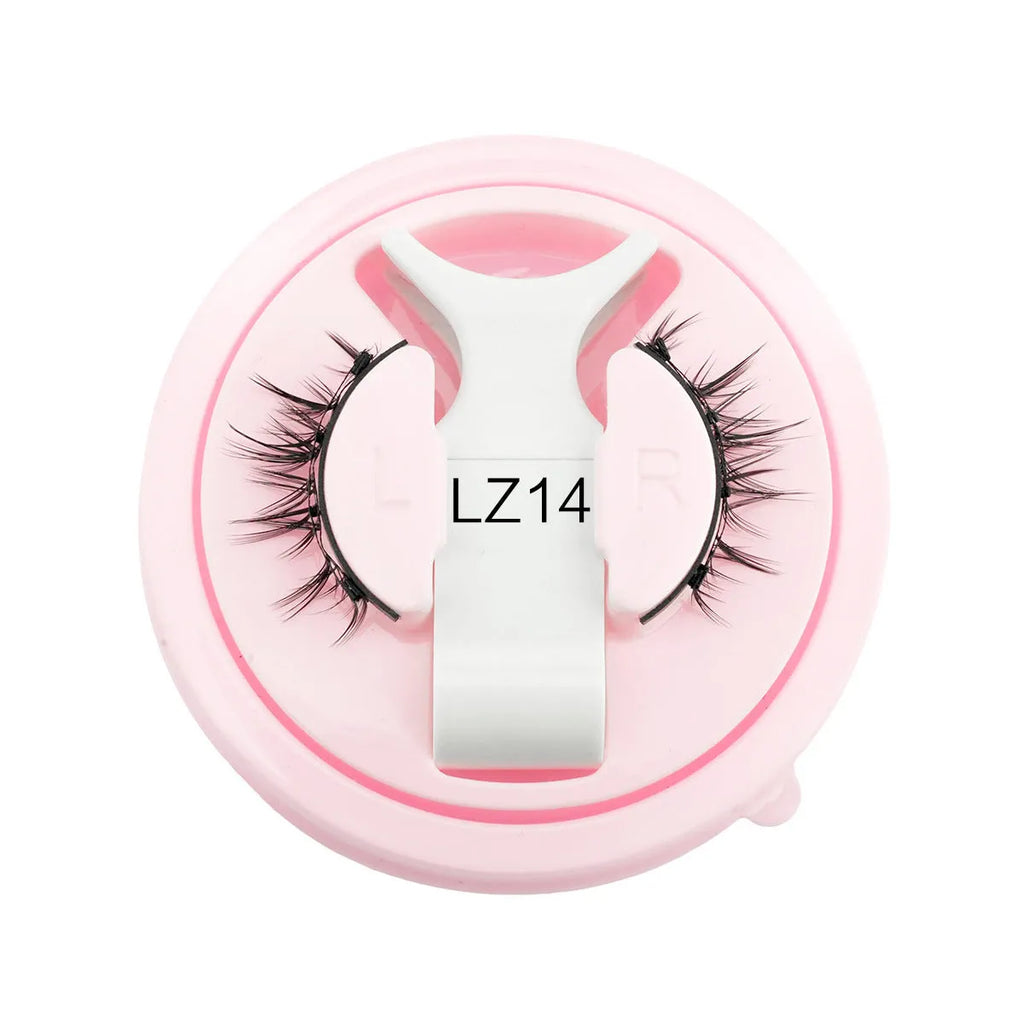 Set of reusable waterproof glue-free false eyelashes in natural thick styles on a clear background.