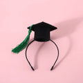 Pet dog wearing British-style felt hair band and matching bow tie accessory set