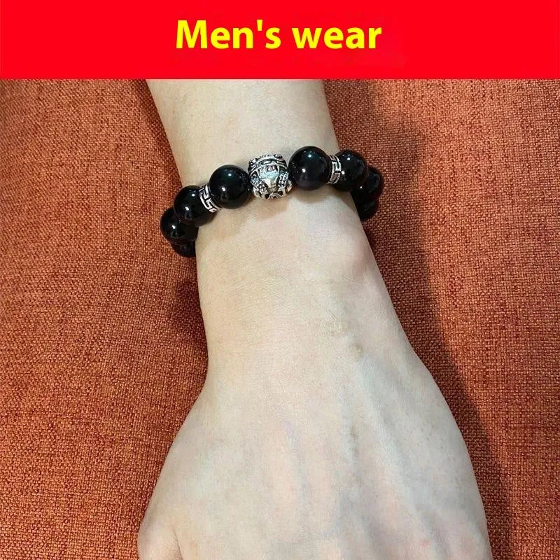 Natural obsidian bead bracelet with silver 999 details, showing male 12mm and female 10mm size options.