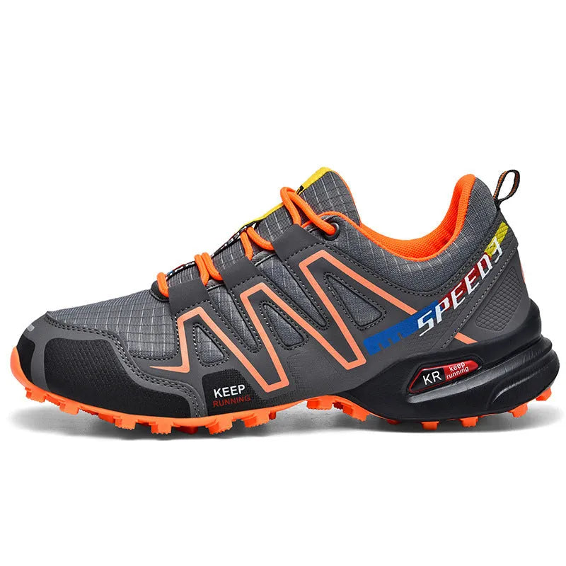 Men's low-top casual shoe in synthetic leather with a mesh lining and rubber sole, shown in grey orange colour.