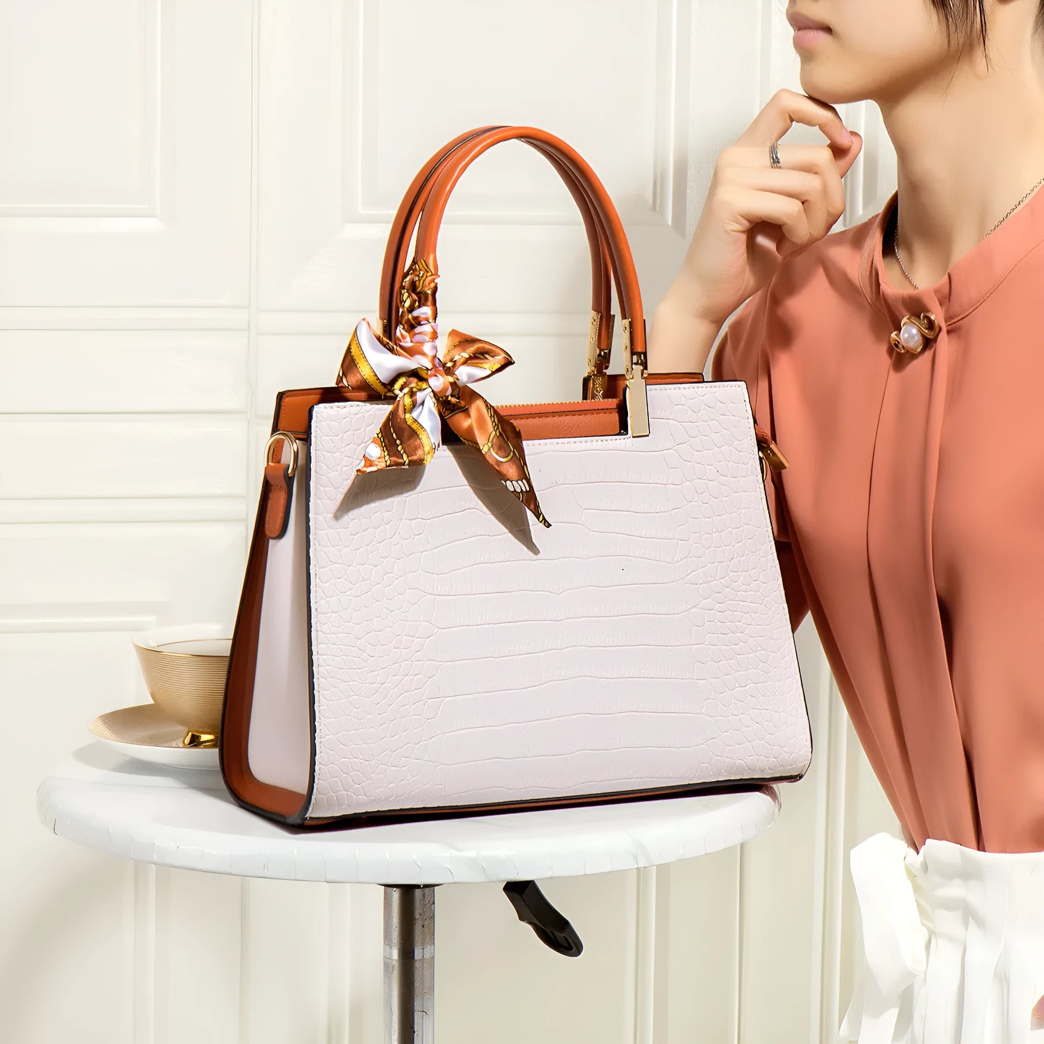 Milky white women's PU shoulder handbag with slit pocket and organised interior compartments
