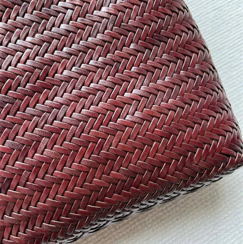 Brown handmade woven tote bag with three-dimensional pocket made from cowhide leather
