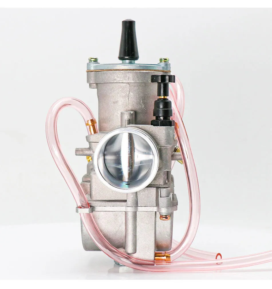 Set of seven sandblasted PWK motorcycle carburettors in sizes 21mm, 24mm, 26mm, 28mm, 30mm, 32mm, and 34mm for performance modification.