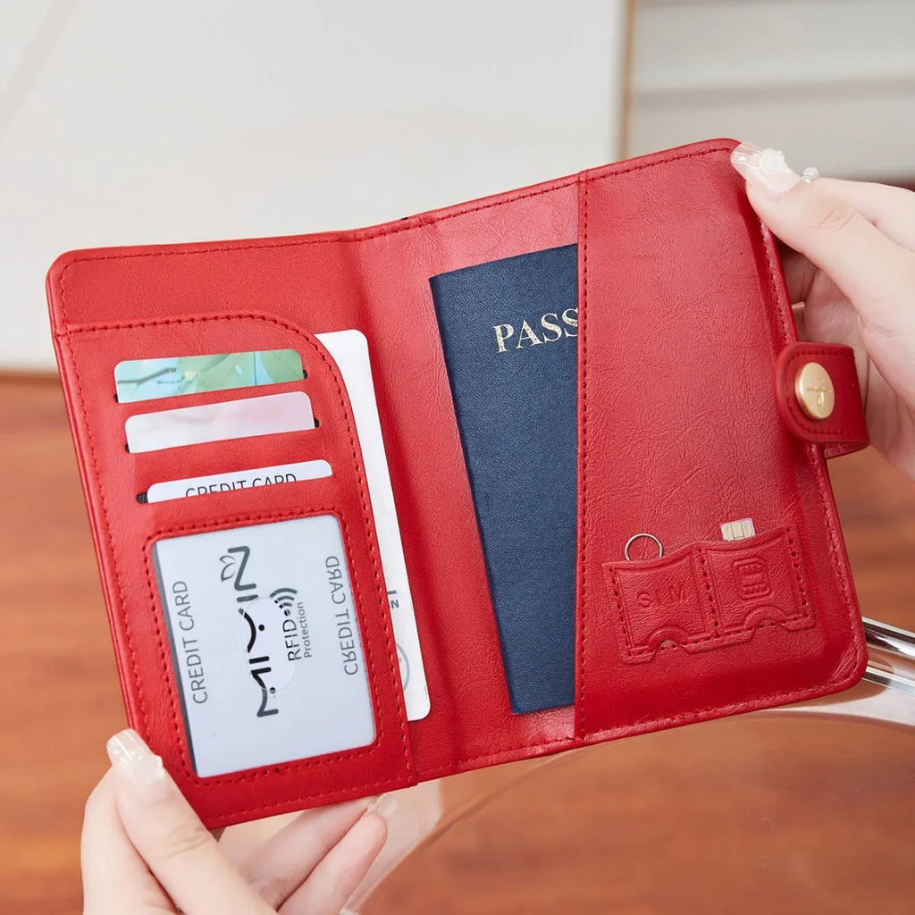 PU leather passport holder with RFID protection in multiple colour options including pink, black, and blue