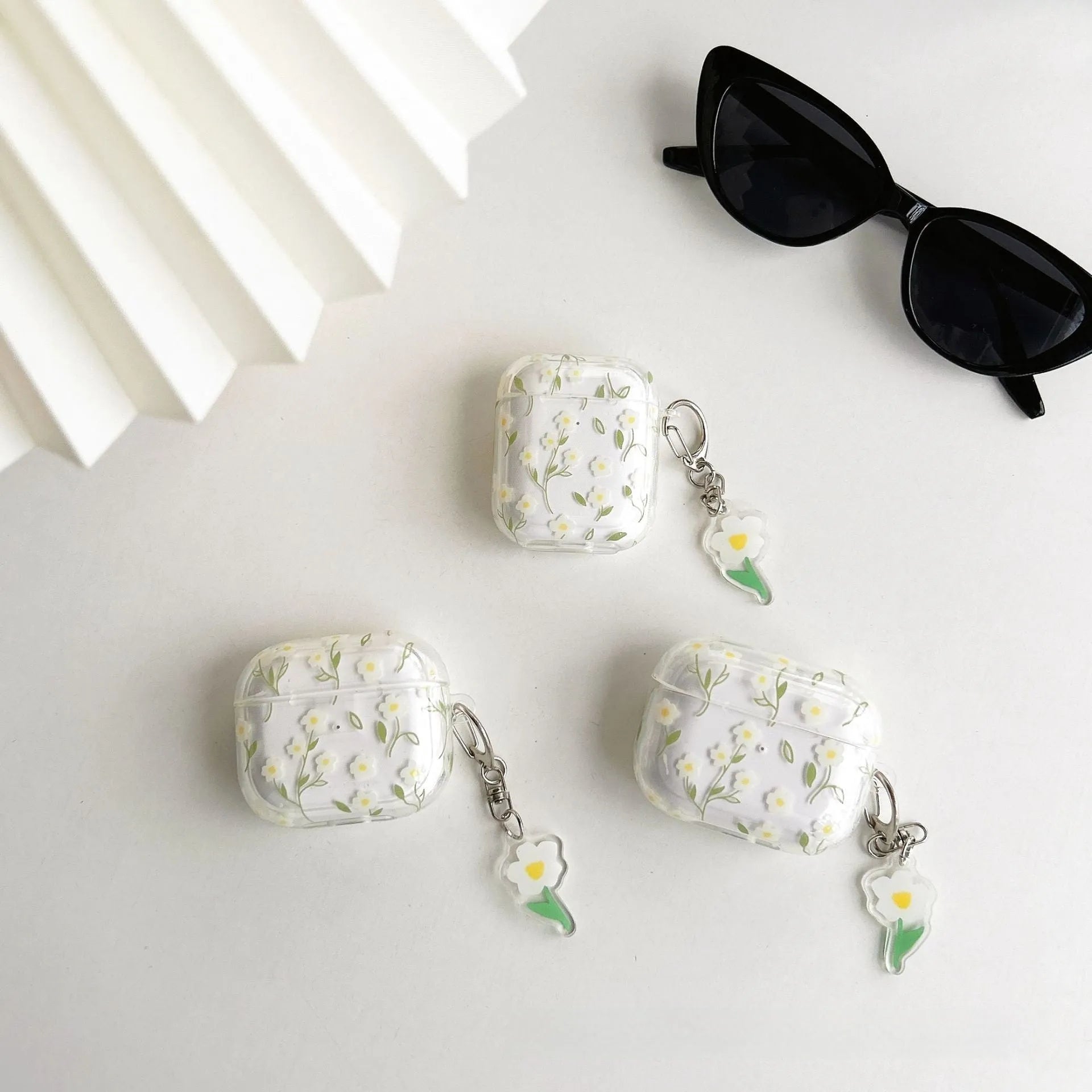 White floral design on clear TPU protective cover for Apple AirPods charging case