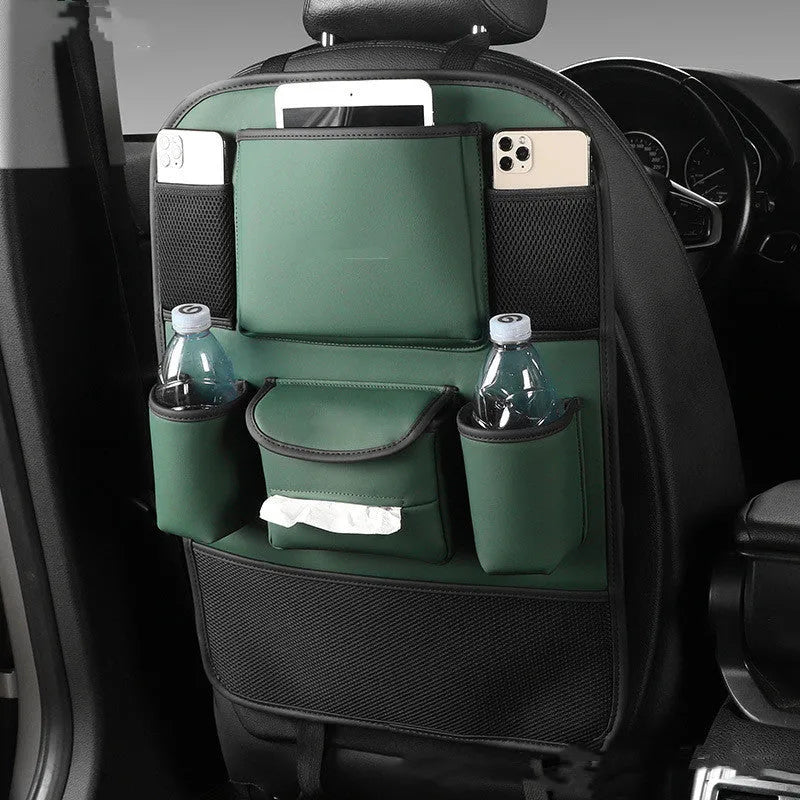 Black leather storage bag hanging on the back of a car seat.