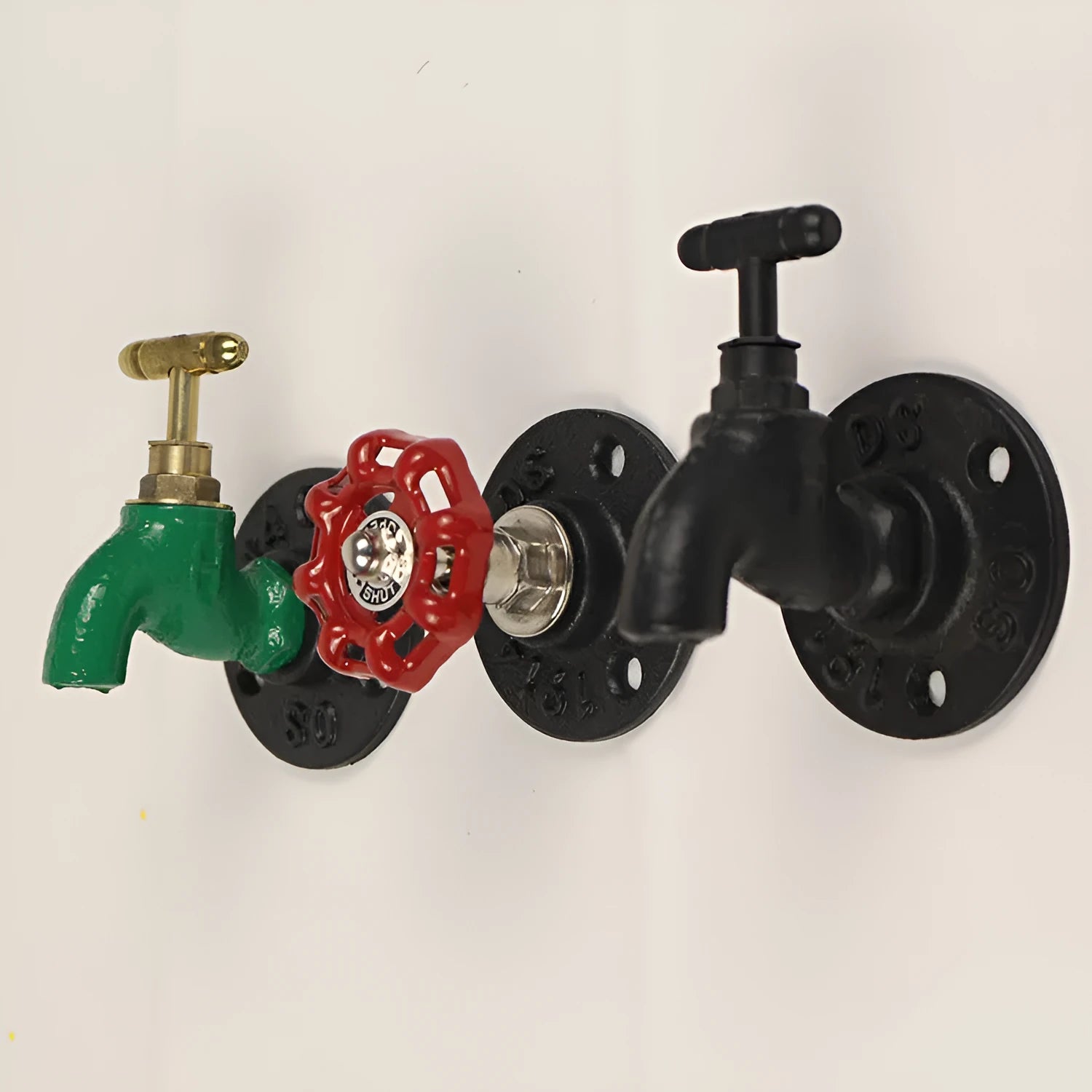 Modern minimalist metal wall hook in a water pipe style, shown in black, green, and red colour options.