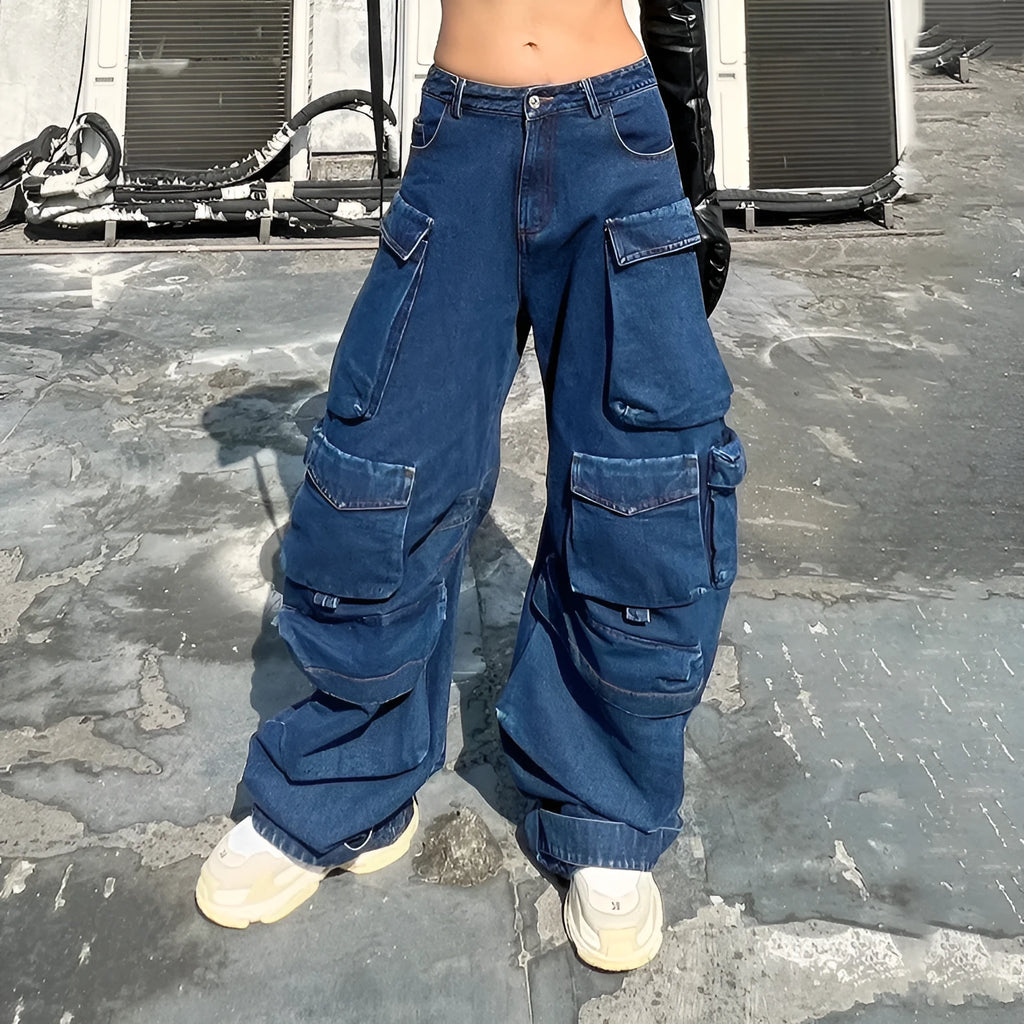 Distressed dark blue wide-leg jeans with high waist and multiple pockets on mannequin