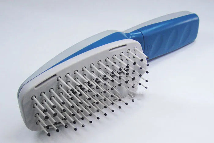 Negative ion pet grooming comb with removable brush head, measuring approximately 21.5cm long