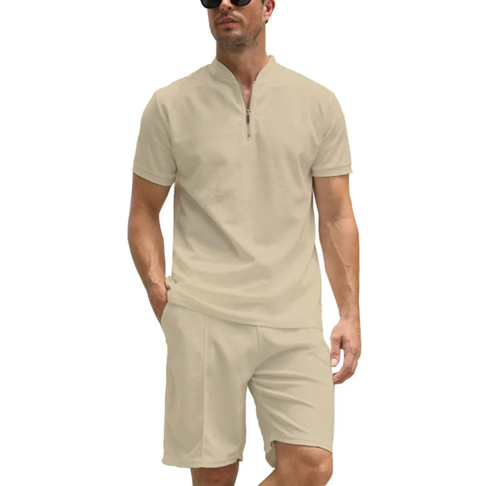 Men's solid colour short sleeve polo shirt and trousers two-piece set on a hanger.