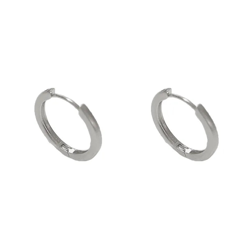 Copper geometric ear clips with gold plating in gold and silver colour options