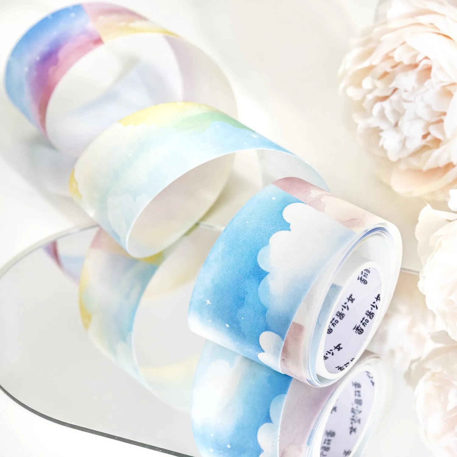 Roll of Japanese paper decorative tape with sky theme designs including clouds and nebula, labelled 30mm width.