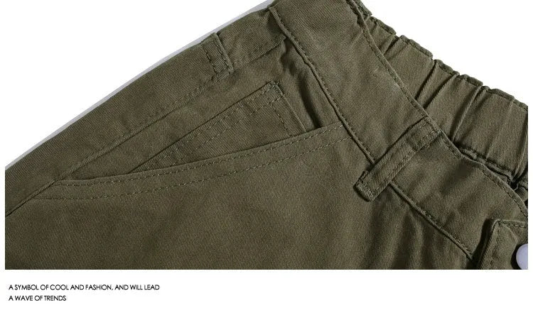 Casual wide-leg cropped workwear pants in apricot colour on a mid-waist fit model.