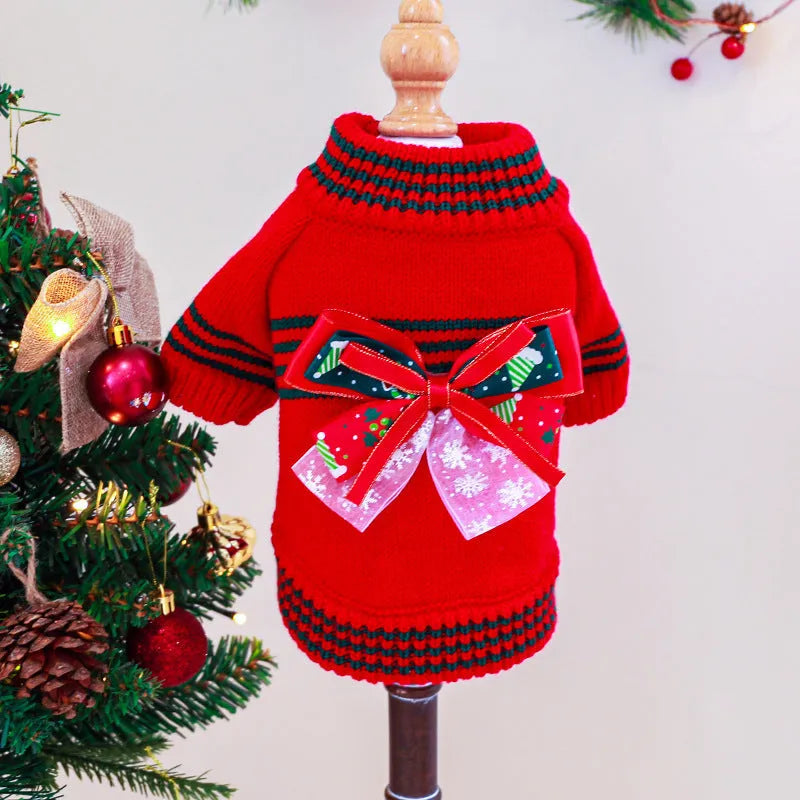 Red Christmas sweater for a small dog on a festive background, showing the 'Merry Christmas' print and pullover style.